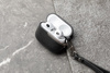 Moshi Pebbo Luxe - pouzdro na AirPods 3 s odnímatelným řemínkem na zápěstí (Charcoal Black)